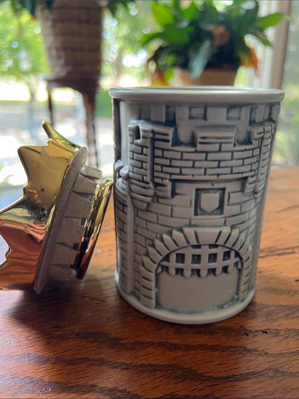 Disney Cinderella Castle Candle with Hold Crown Lid. Almost new!